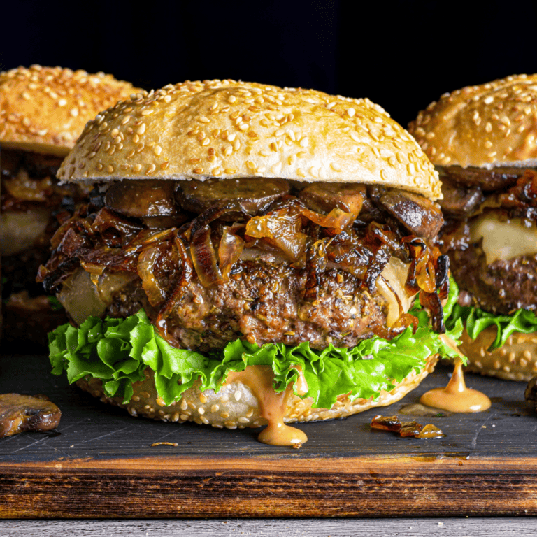 Grilled Burgers with Buttery Mushrooms and Caramelized Onions
