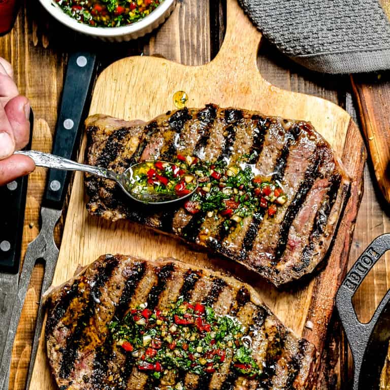 Buttery Steakhouse NY Strip Steaks With Chimichurri